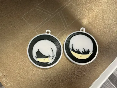 2B and 9s double sided keychain