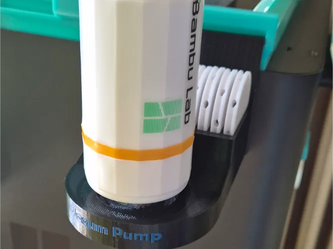 Držák Vakuove pumpy