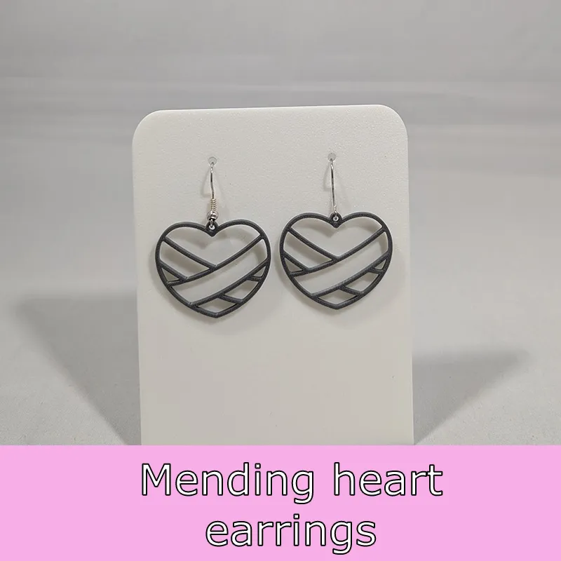 Mending heart earrings view 2