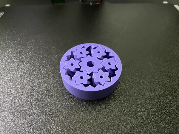 Spinner à engrenages planétaires