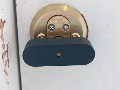 Rotary doorlock attachment