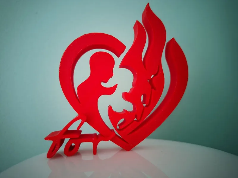 Sculpture burning heart - he and she forever 