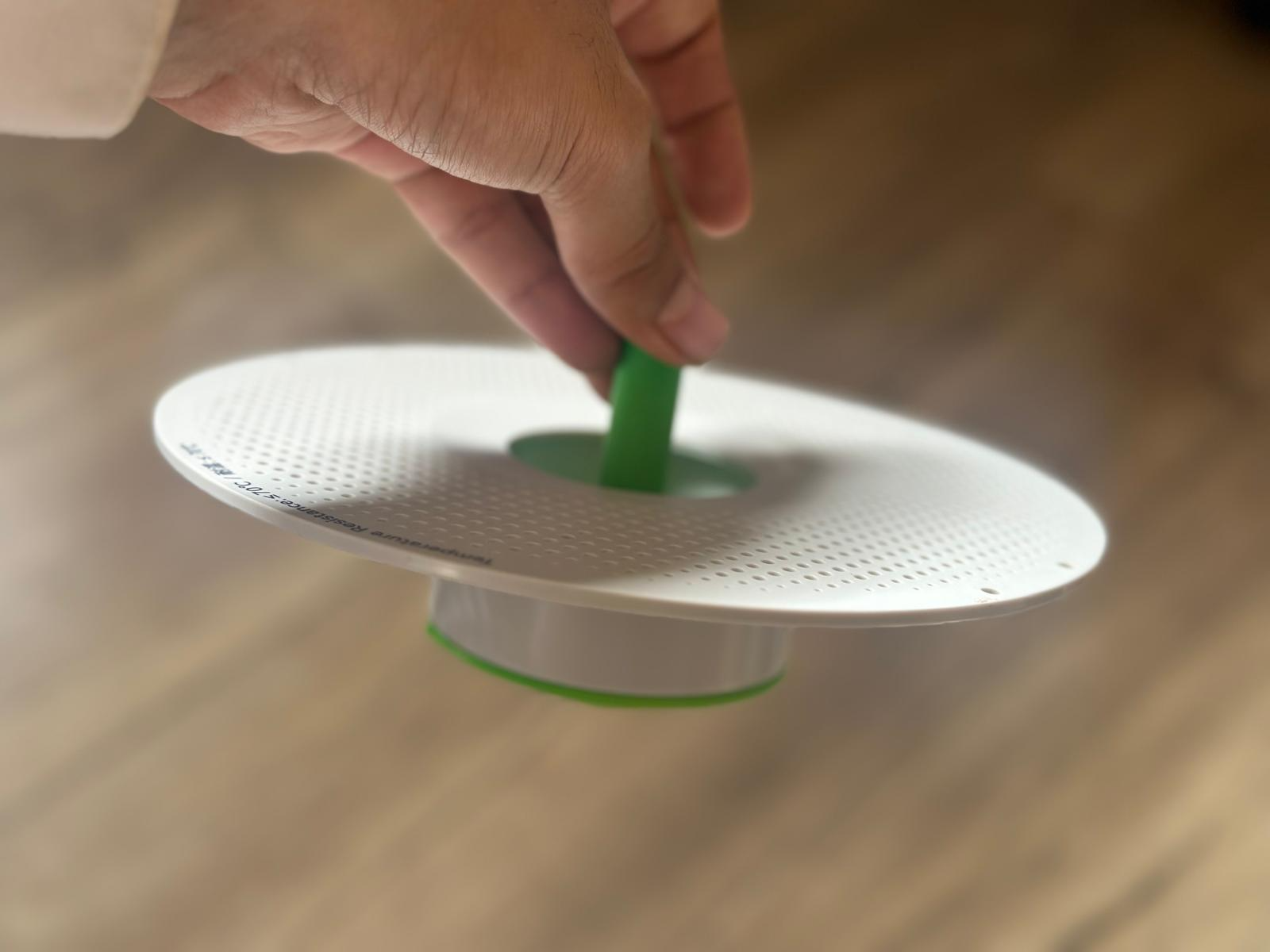 Giant spinning top made of half spool
