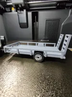 trailer with sides and flip-up ramps