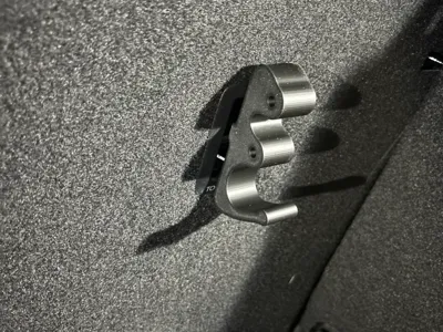 Isofix hook with hole for paracord storage