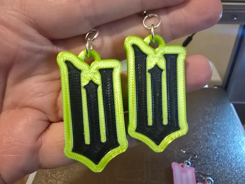 Wicked Logo earrings Elphaba Glenda
