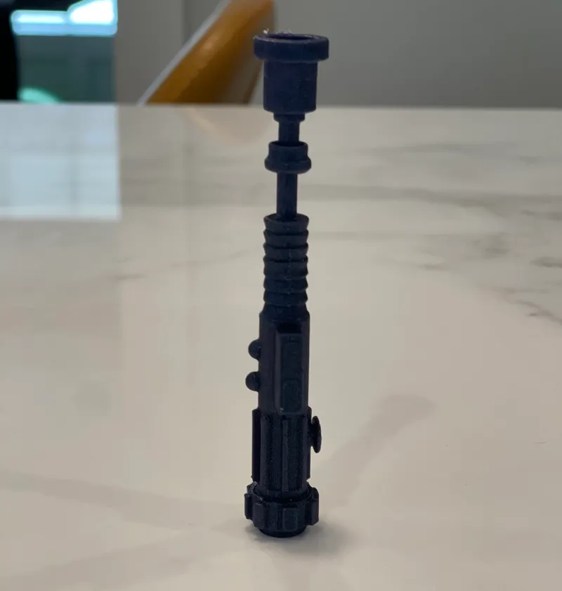 Obi-Wan Kenobi's lightsaber with stand