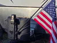 Double flagpole holder