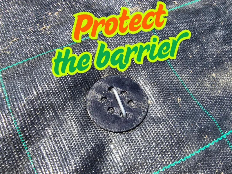 Weed barrier / landscaping cloth spike protector