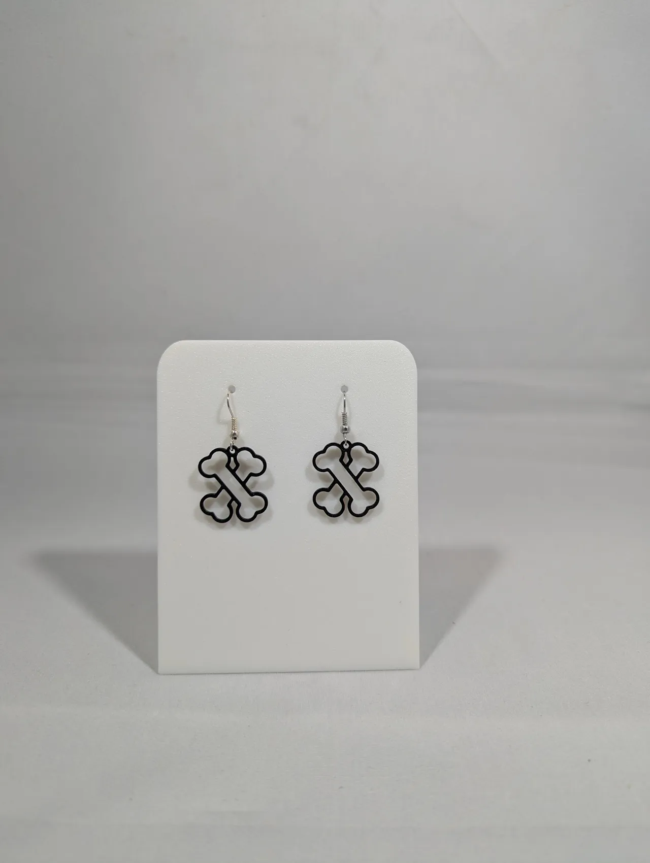 Crossed bone earrings view 4
