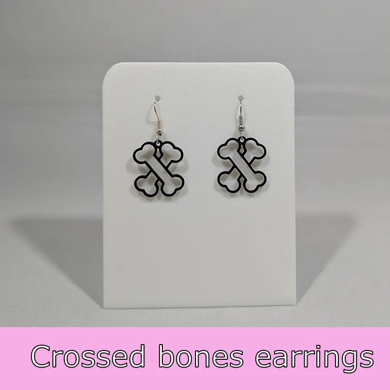 Crossed bone earrings view 2