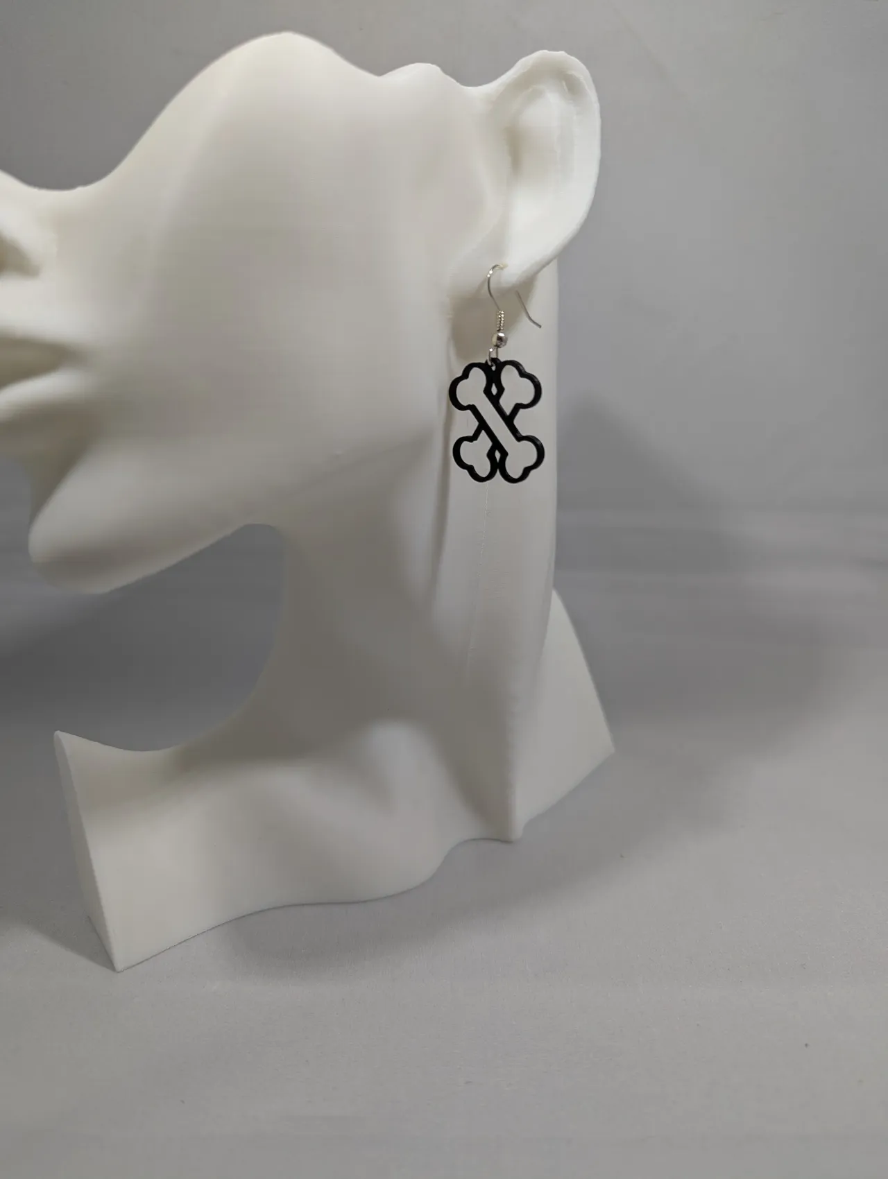 Crossed bone earrings view 3