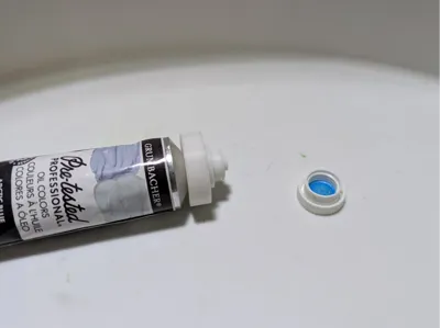 Grumbacher paint tube regulator cap