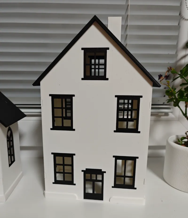 Christmas illuminated house for village