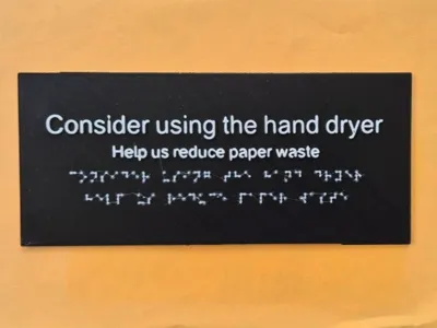 Consider using the hand dryer Sign