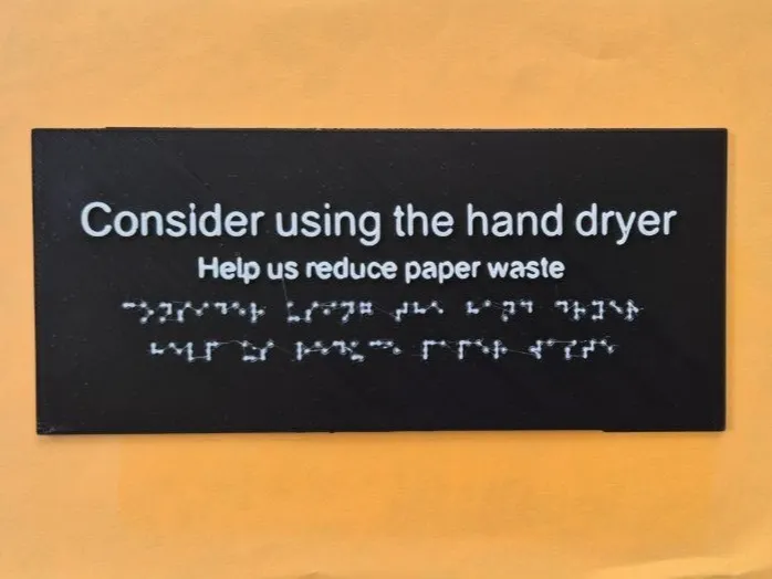 Consider using the hand dryer Sign