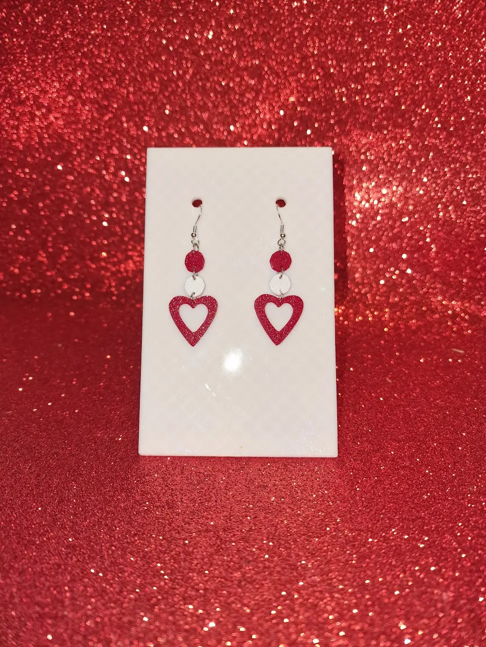 Red and white heart earrings view 2