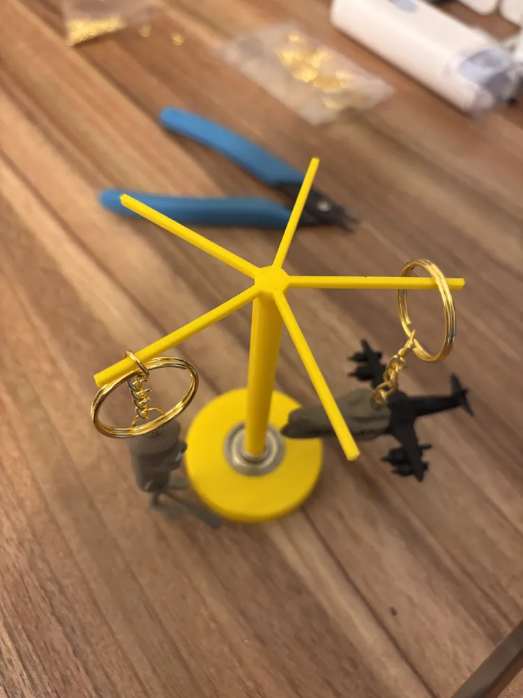 Rotating keychain holder - Free 3D Print Model - MakerWorld