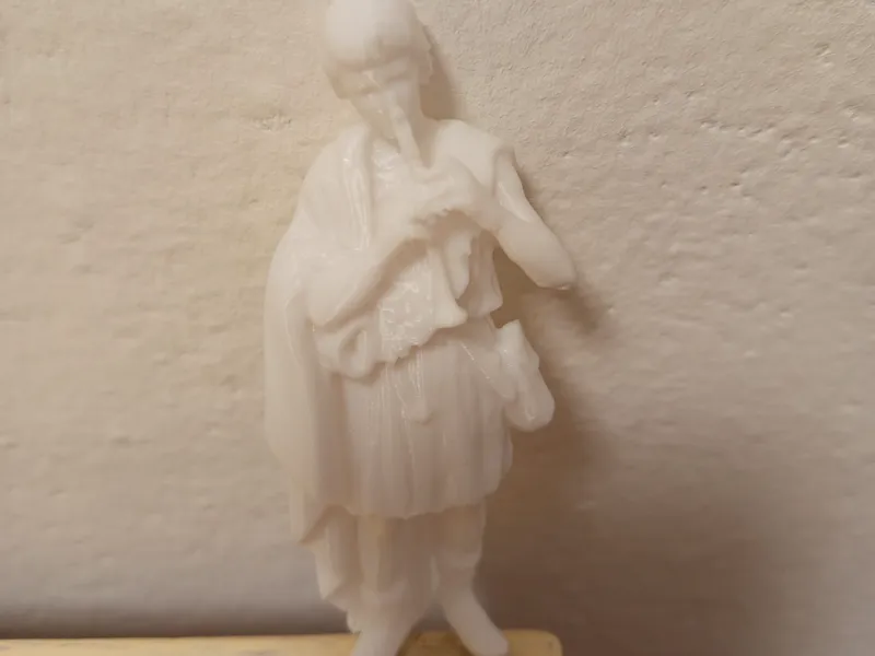 Statuina presepe ( ragazzo con flauto )