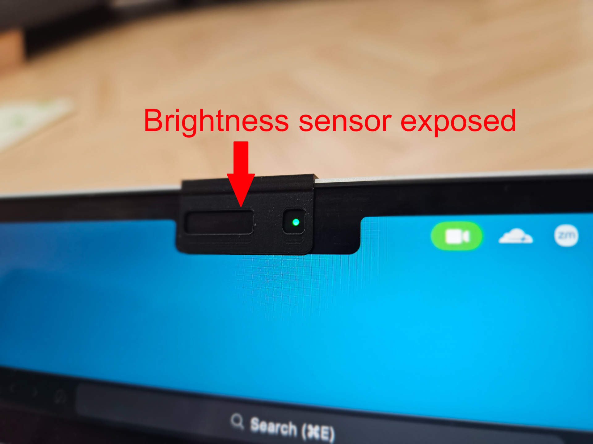 Macbook camera cover - brightness sensor exposed