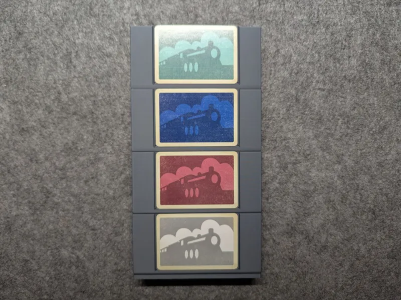 Railway Boom player token container