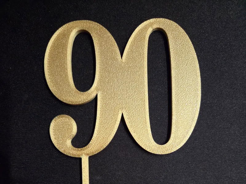 90 cake topper