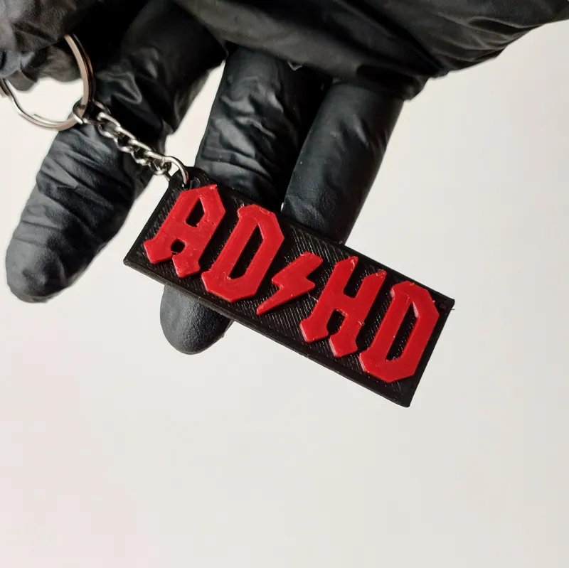 ADHD inspired ACDC keychain two colors