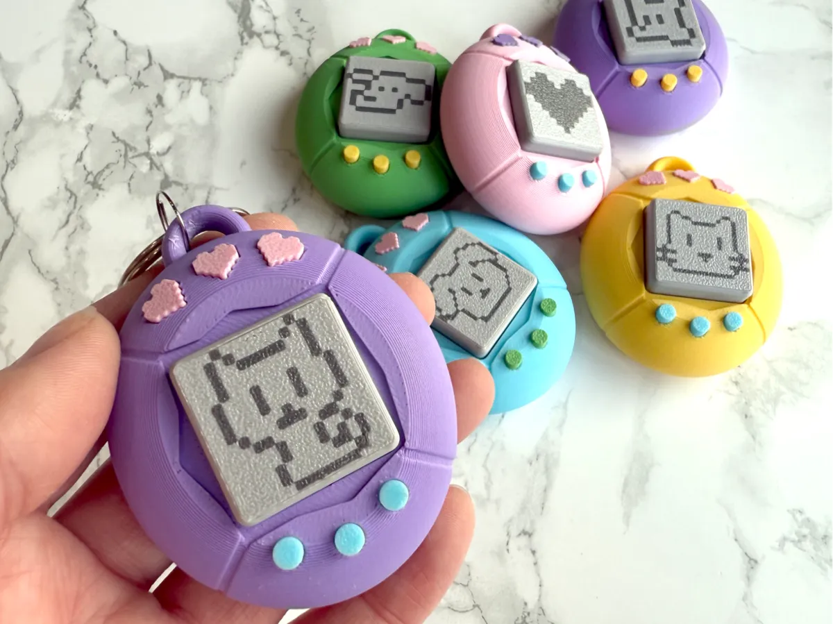 Virtual / Digital Pet Fidget Clicker Keychain by PenolopyBulnick MakerWorld: Download Free 3D Models - 3D model önizlemesi