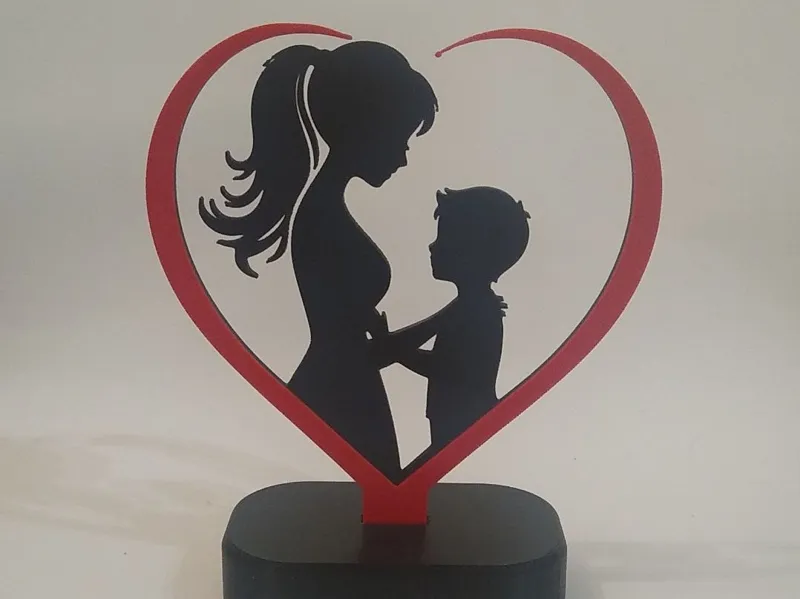 Corazón  silueta de madre e hijo - Día de la Madre
