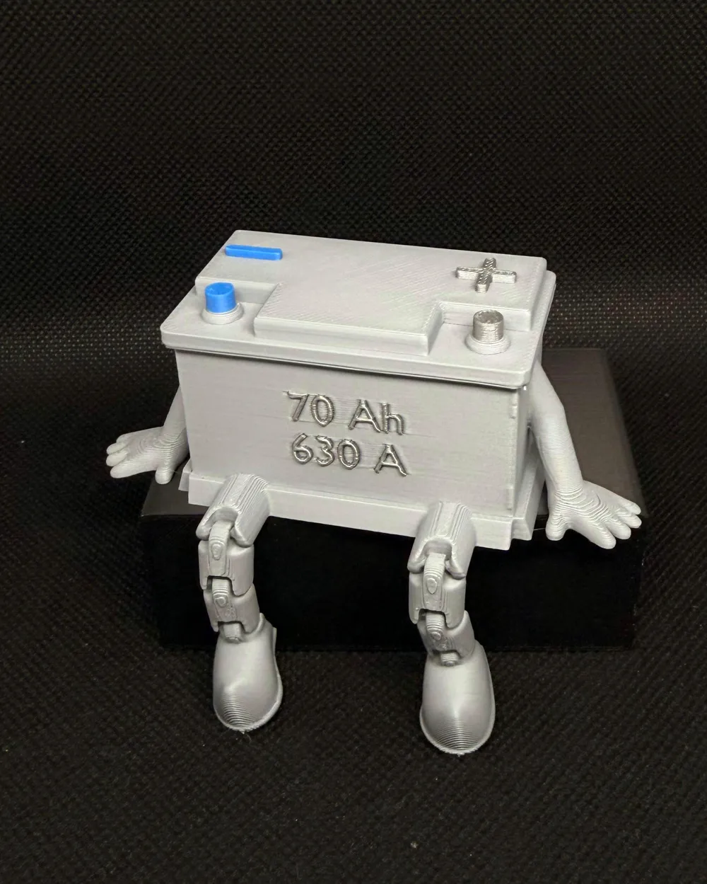 Articulated Flexy Car Battery Buddy - Free 3D Print Model - MakerWorld