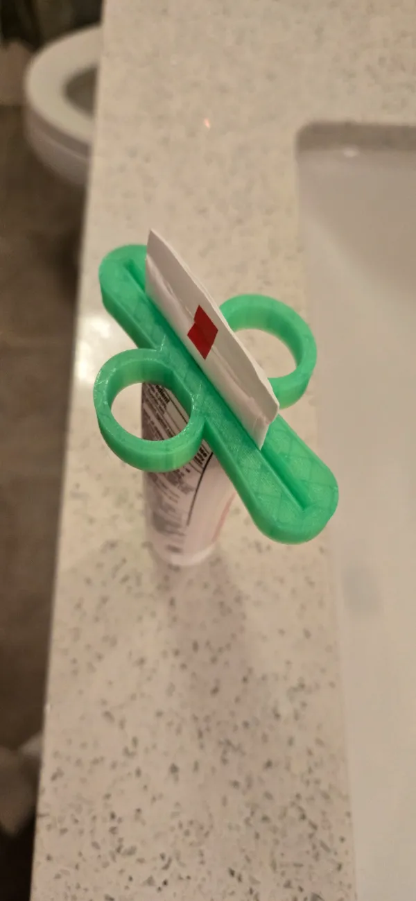 Presse-tube de dentifrice