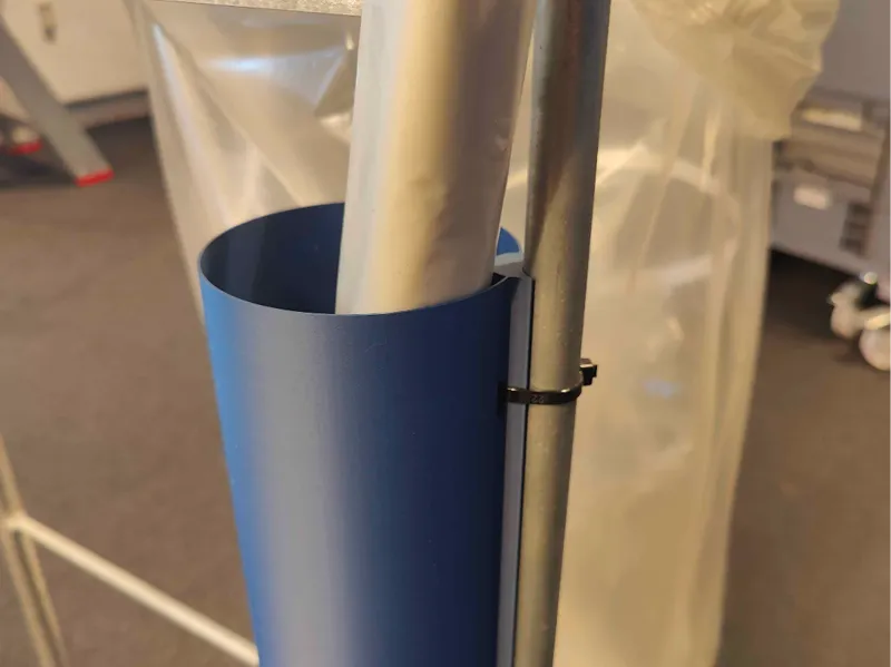 Holder for plastic bag rolls with round mounting