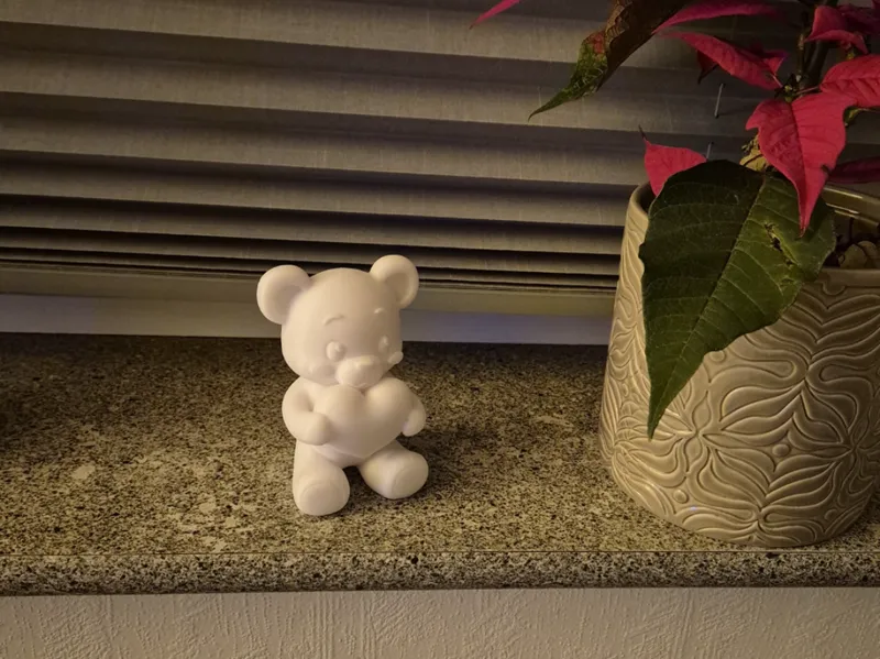 Teddy bear with a heart in its hands