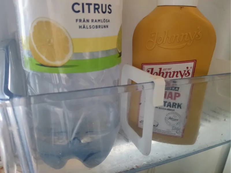 Refrigerator storage divider