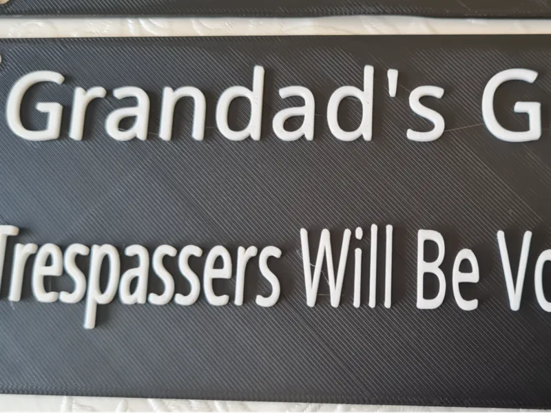 Garage Sign Trespassers Will Be Volunteered