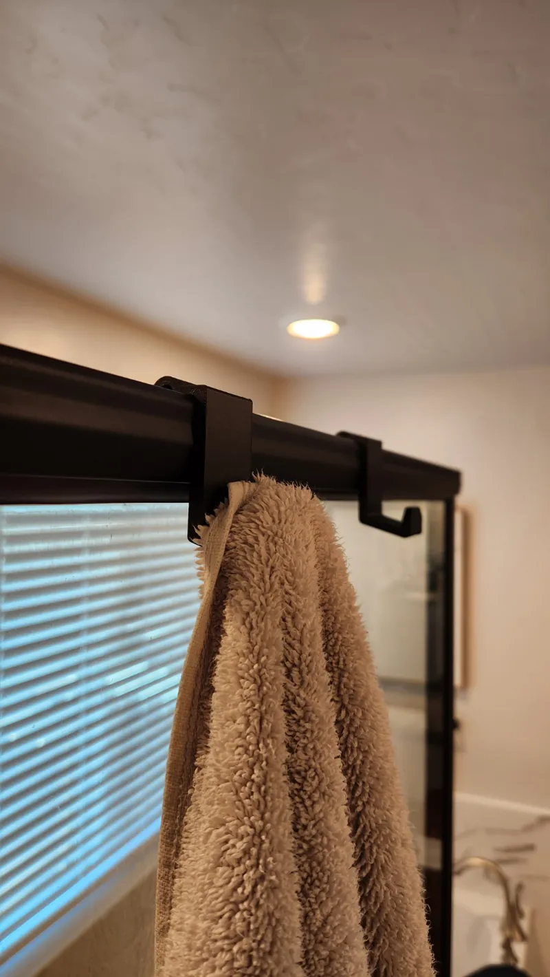 Shower frame towel hook