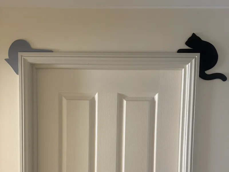 Door Frame Cat and Mouse Chase Silhouettes