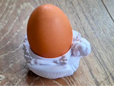 laying chicken egg cup