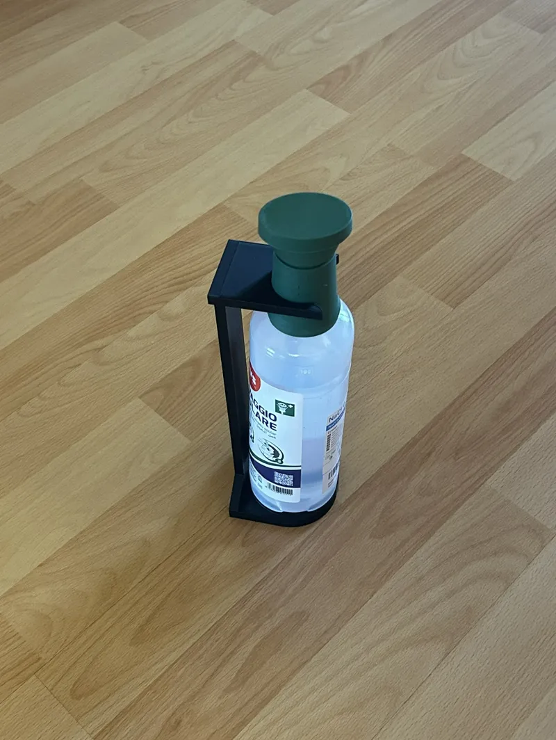 Holder eye wash bottle