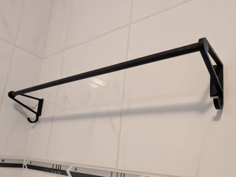 Towel hanger with extra hooks