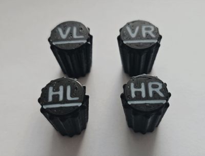 Valve caps with wheel position or lettering