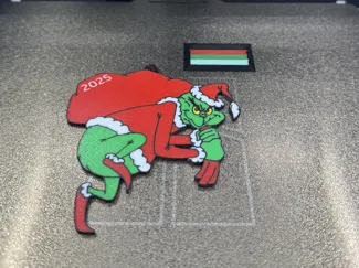 Grinch with Santas Bag 2025