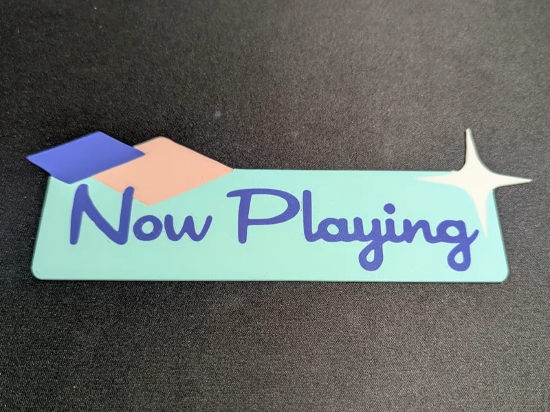 Now Playing Sign