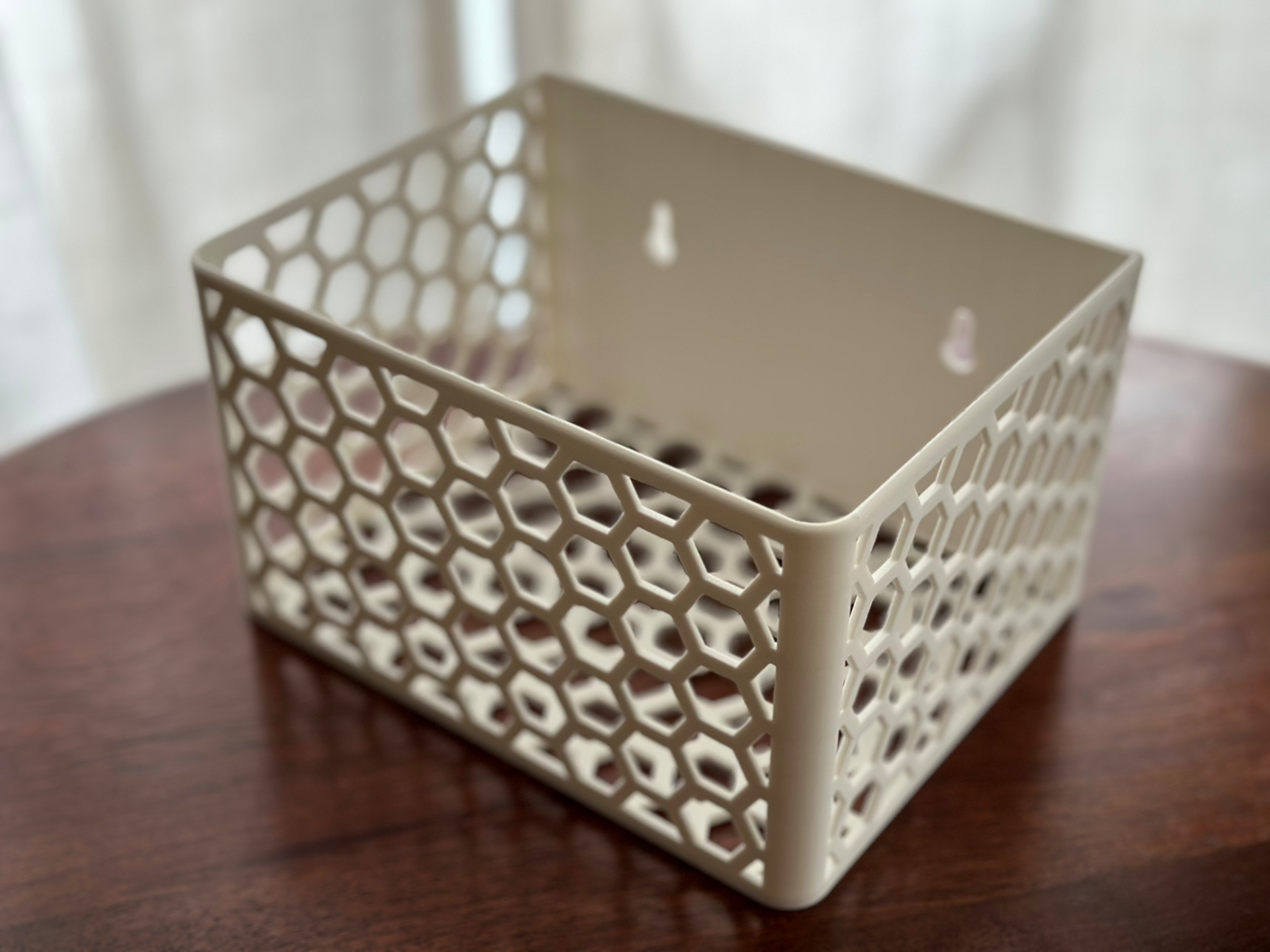 Wall mounted storage basket