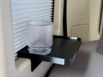Storage for rear window in van camper