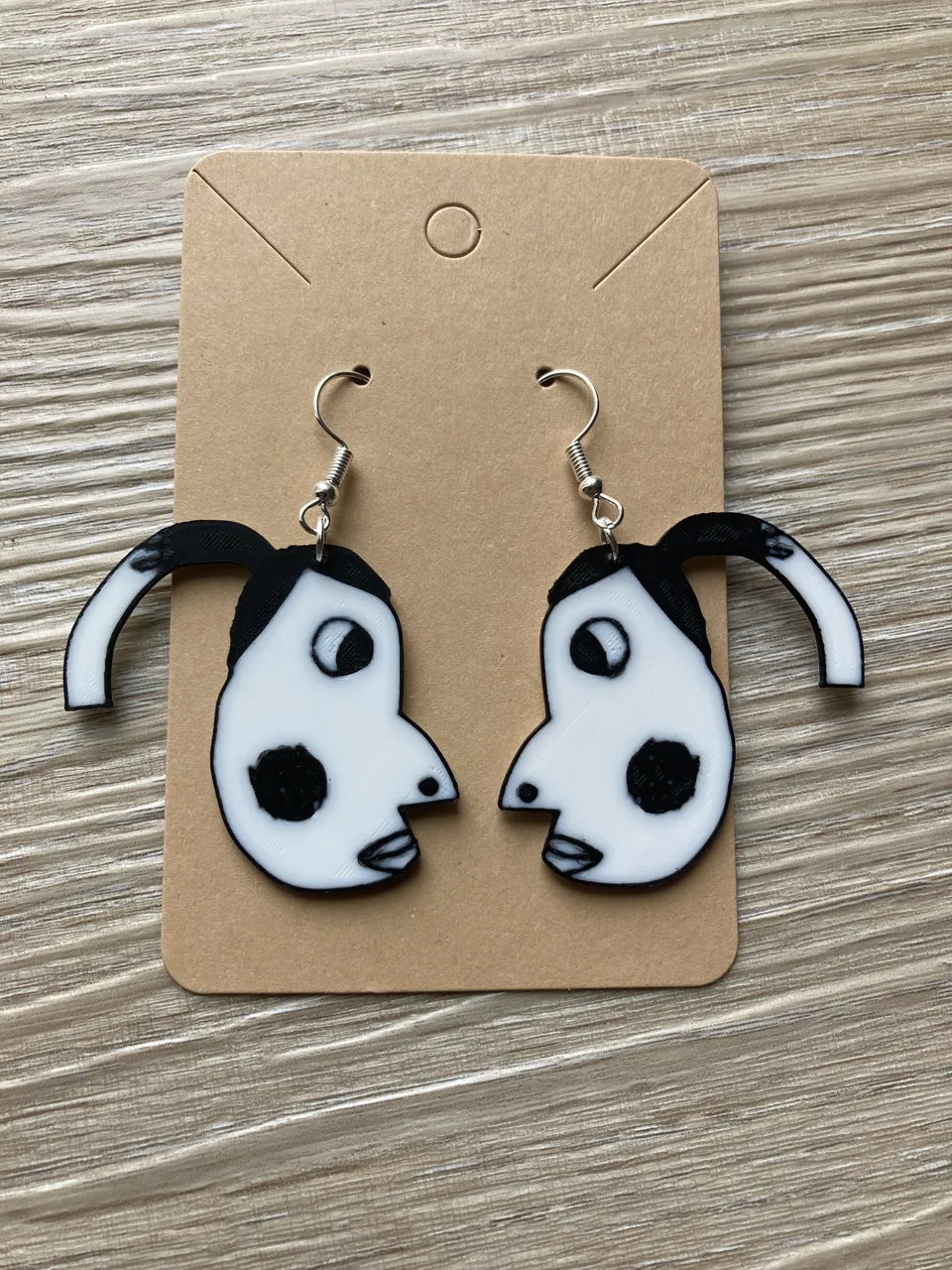 Hyperpigmentetion earrings / keychain meme view 2