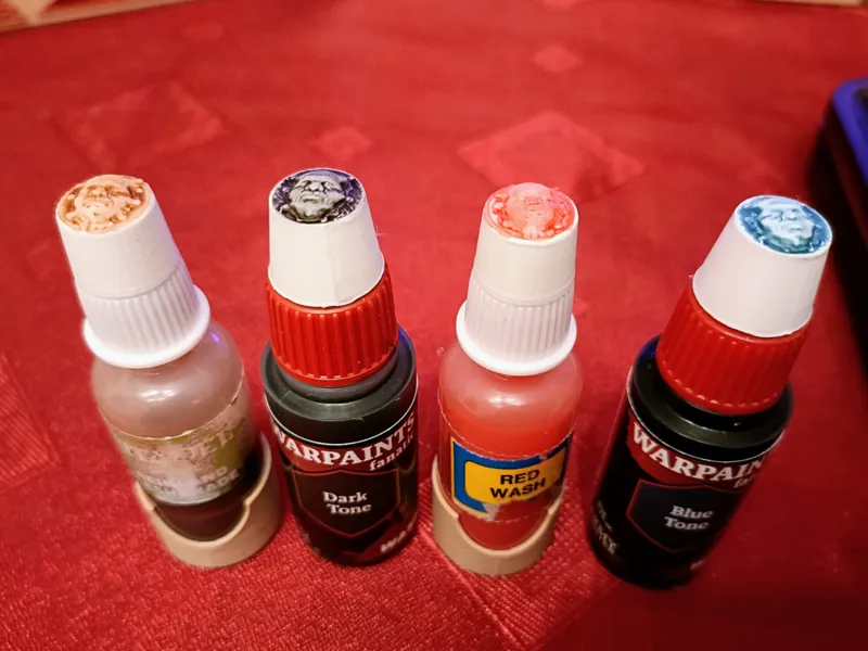 Paint bottle topper face