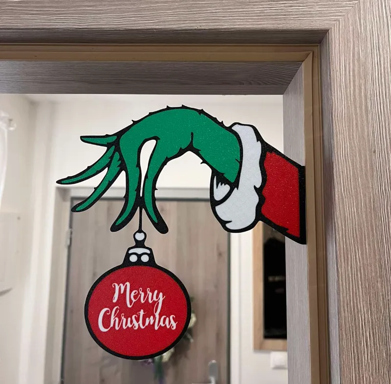 Grinch hands door decor