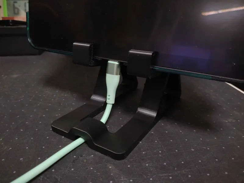 Charging mobile phone/tablet stand