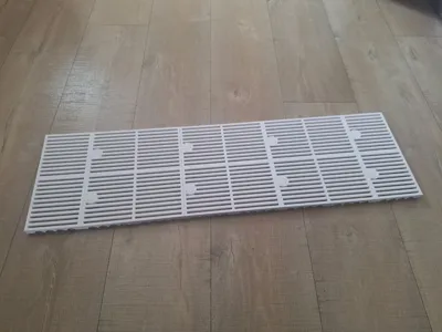 Modular Bottom Riser for Storage Compartment